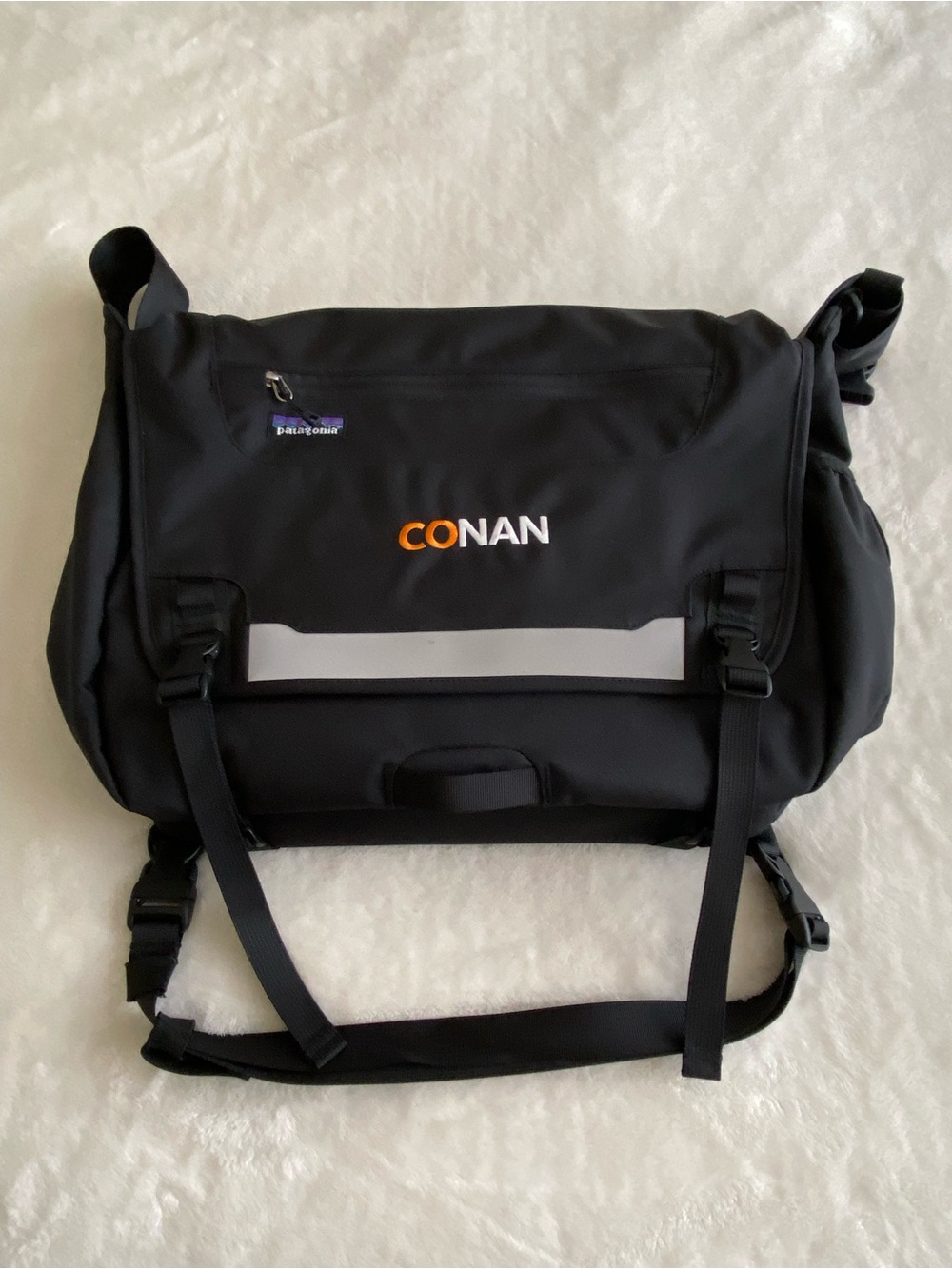 Patagonia Black Messenger Bag with Orange & White CONAN Embroidery